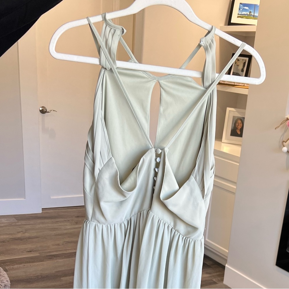 Long green dress.